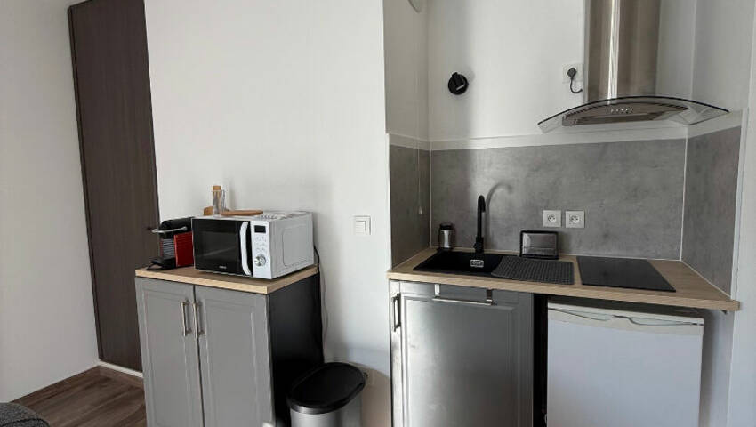 58348198b - Attribut alt par défaut.